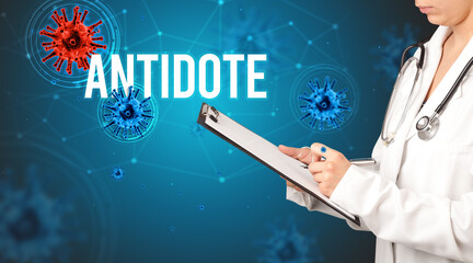 doctor prescribes a prescription with ANTIDOTE inscription, pandemic concept