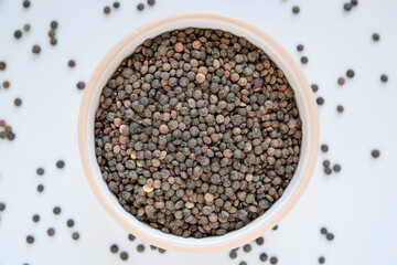 Close-up of a bowl of raw lentils