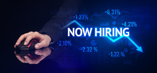male hand holding wireless peripheral with NOW HIRING inscription, modern business concept
