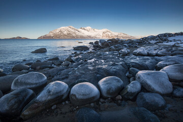 Arctic islands - Vengsoya island viewed from the shores of Kvaloya island, northern Norway
