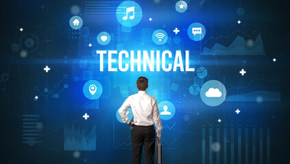 Rear view of a businessman with TECHNICAL inscription, modern technology concept