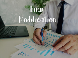 Business concept about Loan Modification with inscription on the piece of paper.
