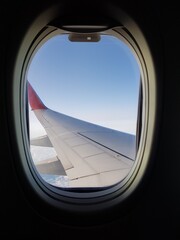 Wing aircraft in the blue sky