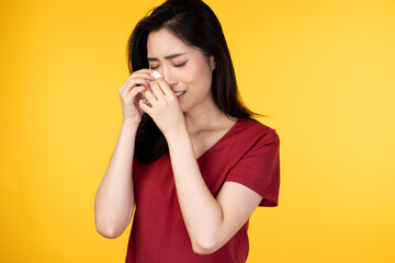 Young woman crying and weeping in tears. Portrait of beautiful young woman depressed, bad mood and cry. Beautiful Asian woman feeling sad, she cried with tears from eyes. Sad young Asian woman cry.