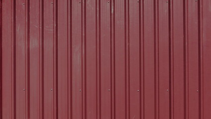 Outdoor temporary corrugated dark red wall partition