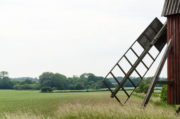 Old windmill in a farmland