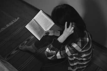 Fototapeta premium person reading a book