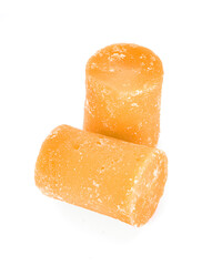 The palm sugar or Jaggery on a white background
