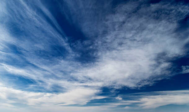 Beautiful blue sky feather clouds, background, wallpaper.