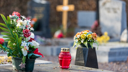 The flowers on the tombs in the cemetery in France