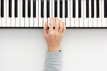 songwriter or dj work place with synthesizer and headphones