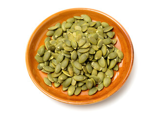 Pumpkin seeds on a white background