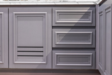 gray kitchen counter drawers in the house