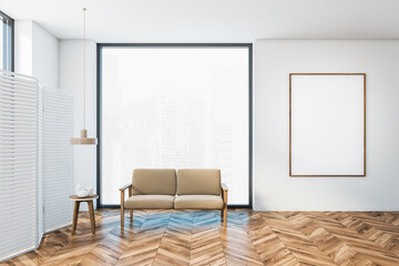 Mockup frame in white hall with sofa and coffee table, wooden screen