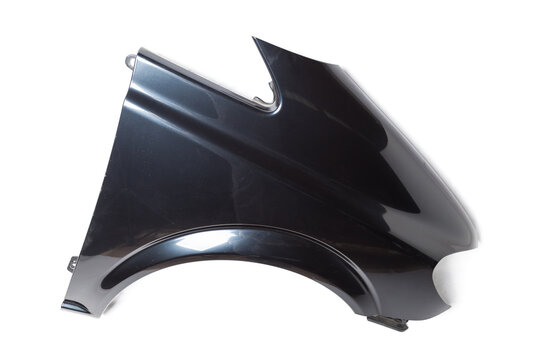 Black plastic fender on a white isolated background in a photo studio for sale or replacement in a car service. Mudguard on auto-parsing for repair or a device to protect the body from dirt.