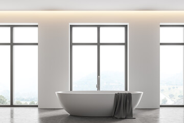 Obraz na płótnie Canvas White bathroom interior with tub and windows