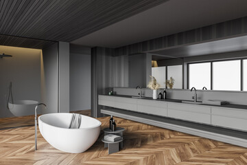 Stylish gray and wooden bathroom with tub, sink and shower