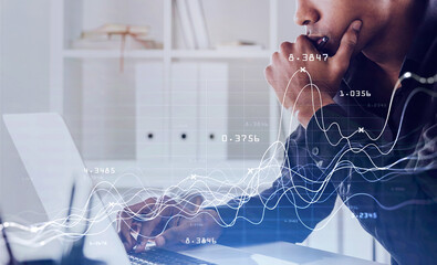 African man in office and graphs