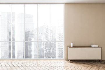 Wooden small chest of drawers against beige wall and window with city view