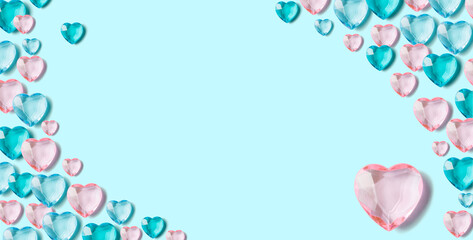 Banner with pink and blue crystal hearts on light blue background.  Frame with copy space.