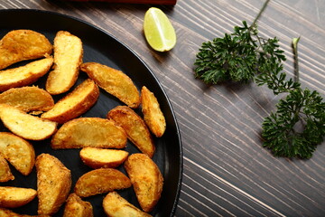 Fresh foods- baked potato wedges with spices.