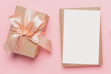 Gifts with note letter on isolated pink background, love and valentine concept