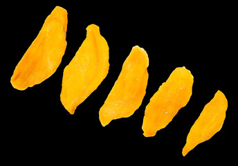 Naklejka premium Dried mango isolated on black background.