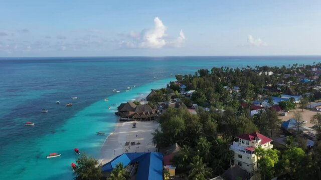 Zanzibar. Aerial view Zanzibar Tanzania. Drone flying over the coastline with rocks and reefs on the shores of the Indian Ocean with blue water and beaches.