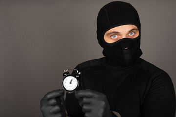 Man with black mask with handcuffs