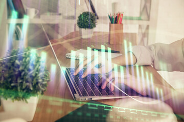 Naklejka na ściany i meble Double exposure of woman hands typing on computer and forex chart hologram drawing. Stock market invest concept.