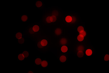 Round light bokeh on black isolated background