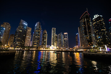 Fototapeta na wymiar UAE, Dubai - December, 2020: Dubai Marina illuminated at night. United Arab Emirates