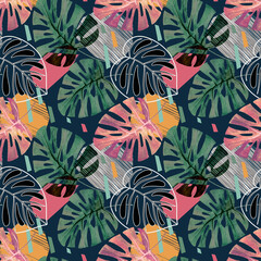 Seamless tropical pattern with palm leaves on dark blue background