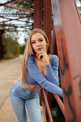 Fototapeta premium woman, young, fashion, beauty, beautiful, dress, model, street, person, city, people, urban, cute, outdoors, portrait, one, lady, hair, happy, white, jeans, park, smile, summer, walking