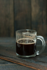 cup of coffee on wooden table