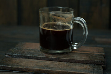 cup of coffee on wooden table