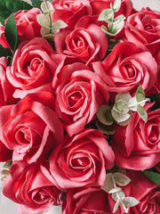 Red rose flowers made from soap close-up background