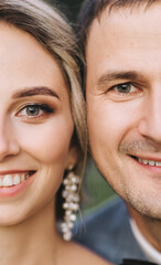 Two halves of a face close-up of a smiling bride and groom. Wedding portrait of newlyweds.