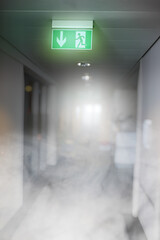 smog and smoke in the office building - emergency exit - 404243027