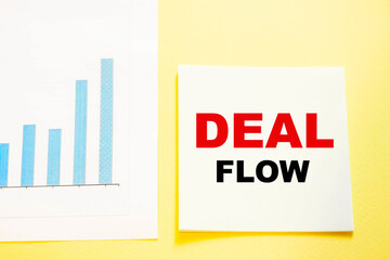 Business text DEAL FLOW on a refreshing yellow background with a graph.