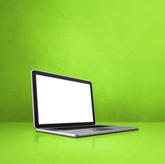 Laptop computer on green office scene background