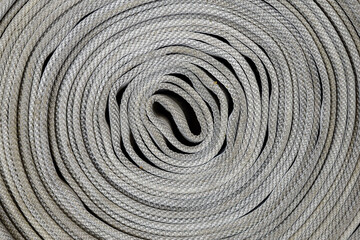 Fototapeta premium The inner part of the coiled fire hose.