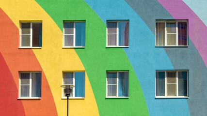 Building with painted walls. The wall is painted in rainbow colors.