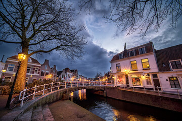 Canal with bridge and historic houses in the old city center of Haarlem, the Netherlands