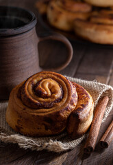 Fresh Cinnamon Roll and Cup of Coffee