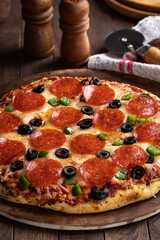 Pepperoni Pizza With Olives and Peppers