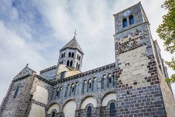 Fototapeta premium view of the 12th century romanesque church of the small town of Saint Nectaire in Auvergne, France