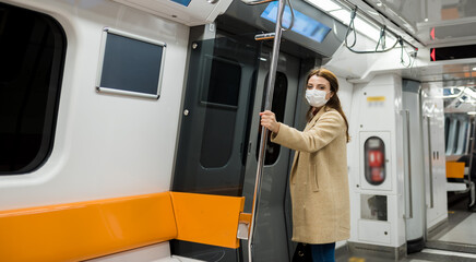 Portrait of beautiful girl wearing protective medical mask