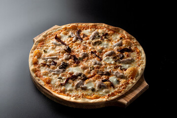 Plain chicken and mushroom pizza with melted cheddar cheese on a thin dough, light dietary pizza