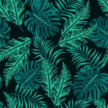 Tropical seamless pattern with plants and leaves on a dark background. Creative abstract background. Exotic wallpaper, Hawaiian style. Jungle leaves. Botanical pattern.